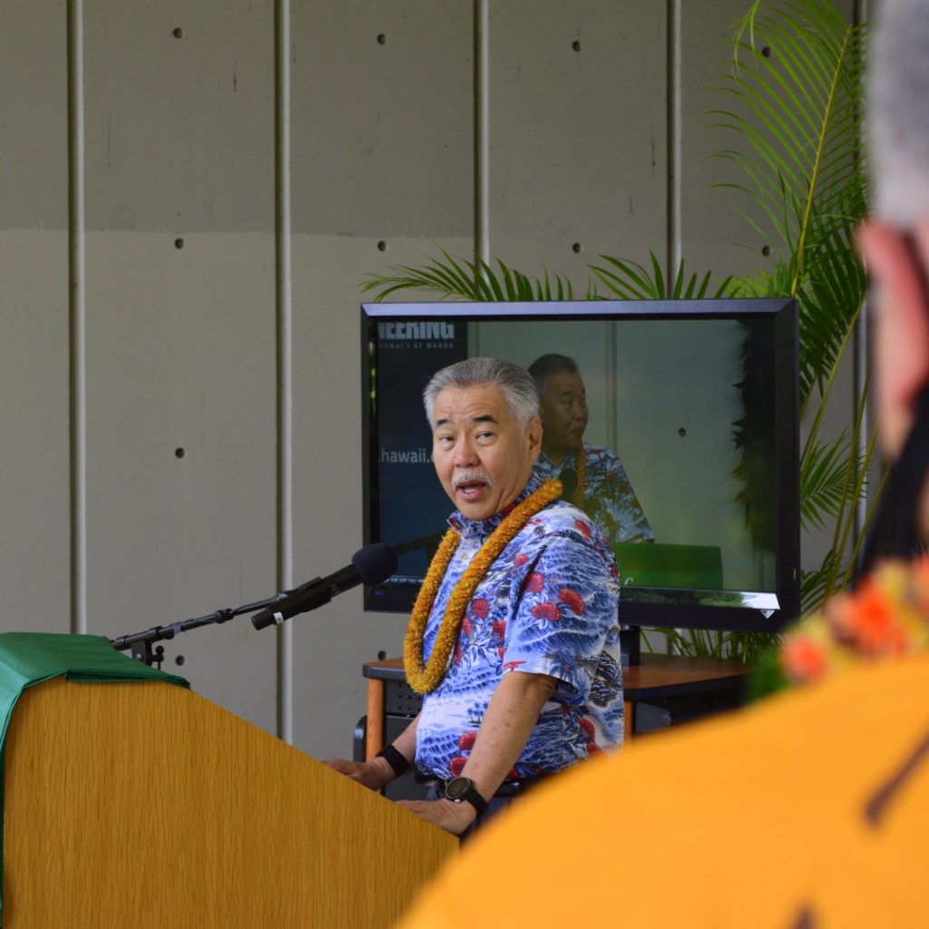 Dean Morioka Looks On While Governor Ige Delivers His Speech.