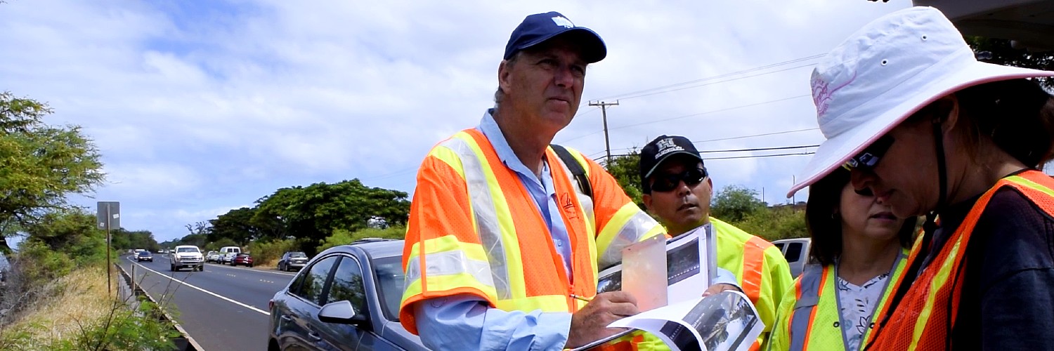 Prof. Brandes Surveying A Section Of Highway On Maui