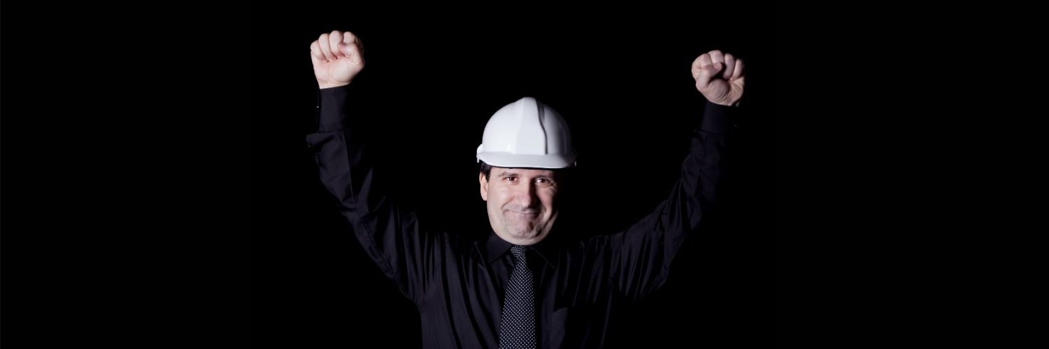 Engineer Raising His Arms In Triumph