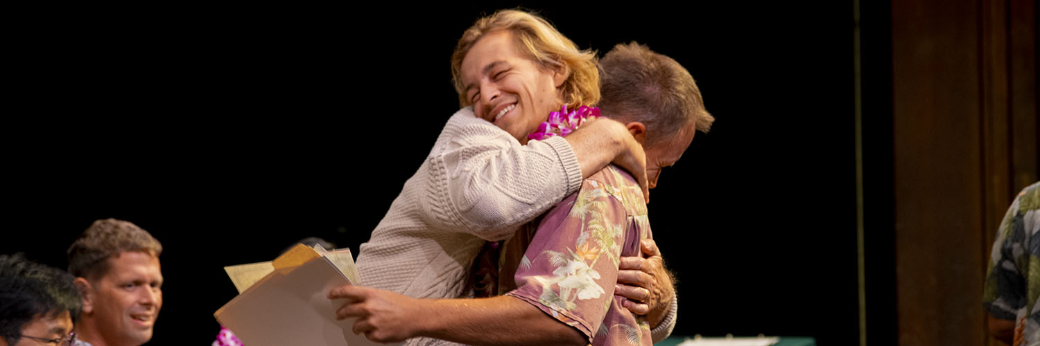 Student And Teacher Embracing