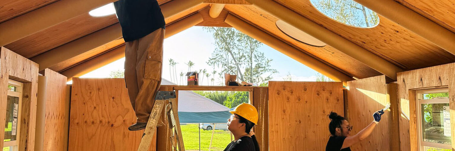 Students Working On A House