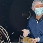 An Earth and planetary exploration technology student in a vacuum chamber.