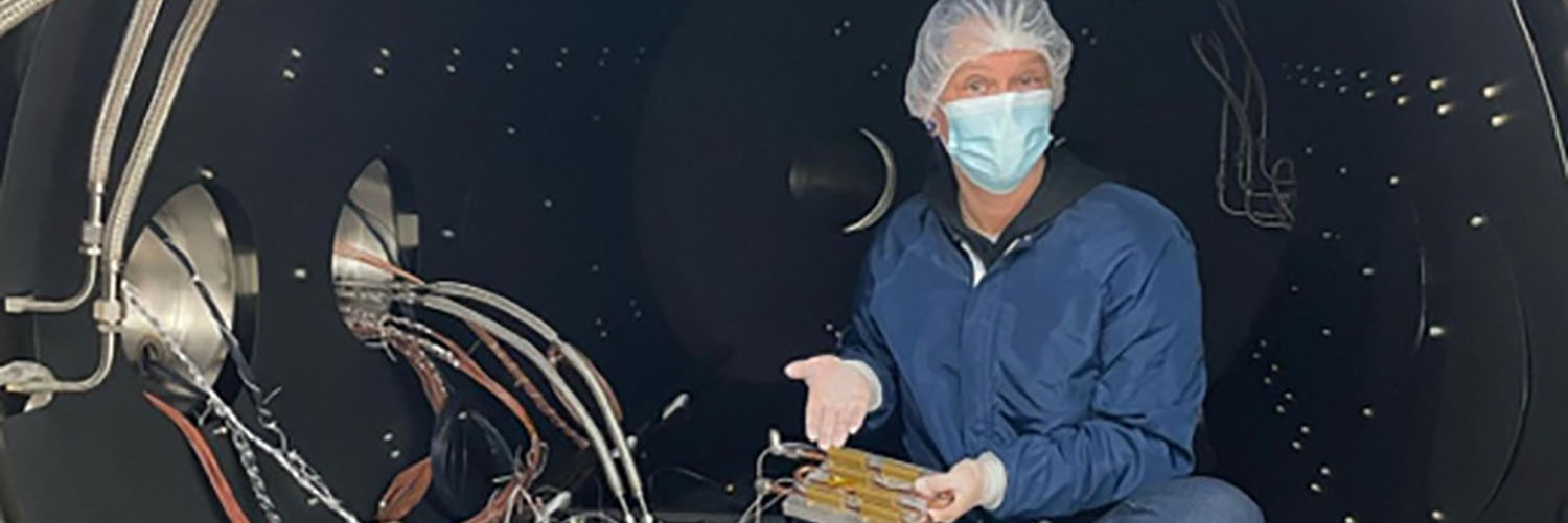 An Earth And Planetary Exploration Technology Student In A Vacuum Chamber.