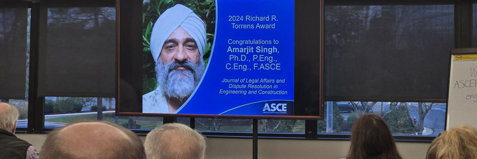 Photo Of Prof. Singh Being Congratulated For Receiving The 2024 Torrens Award