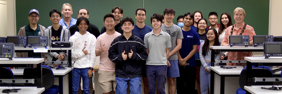 A Group Of Students In A Classroom Posing For A Photo